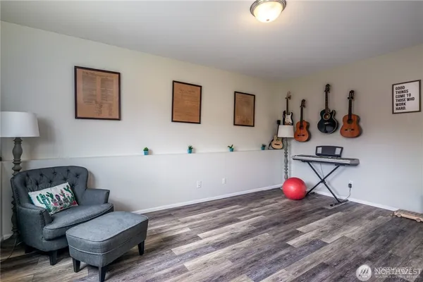 a living room with furniture and a table
