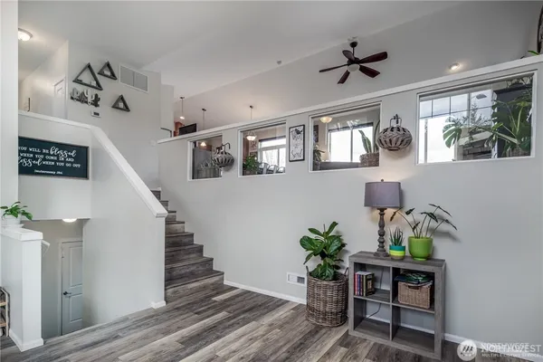 a view of entryway with wooden floor