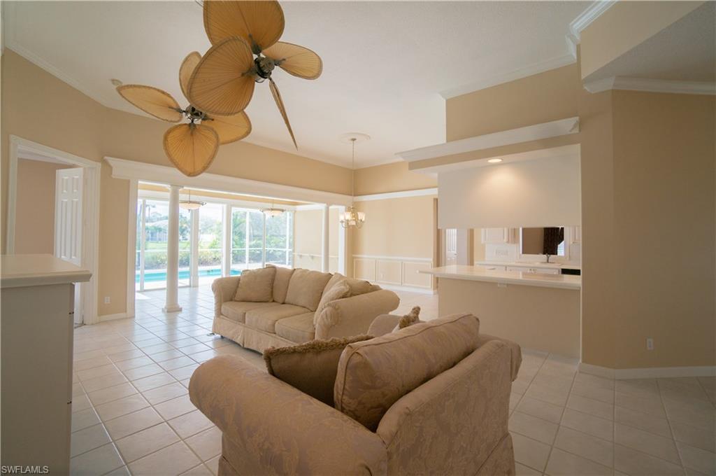 5120 Inagua Way Naples, FL 34119 - Photo 13 of 35 a living room with furniture and a window