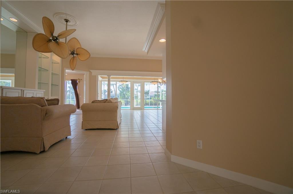 5120 Inagua Way Naples, FL 34119 - Photo 8 of 35 a living room with furniture and a large window