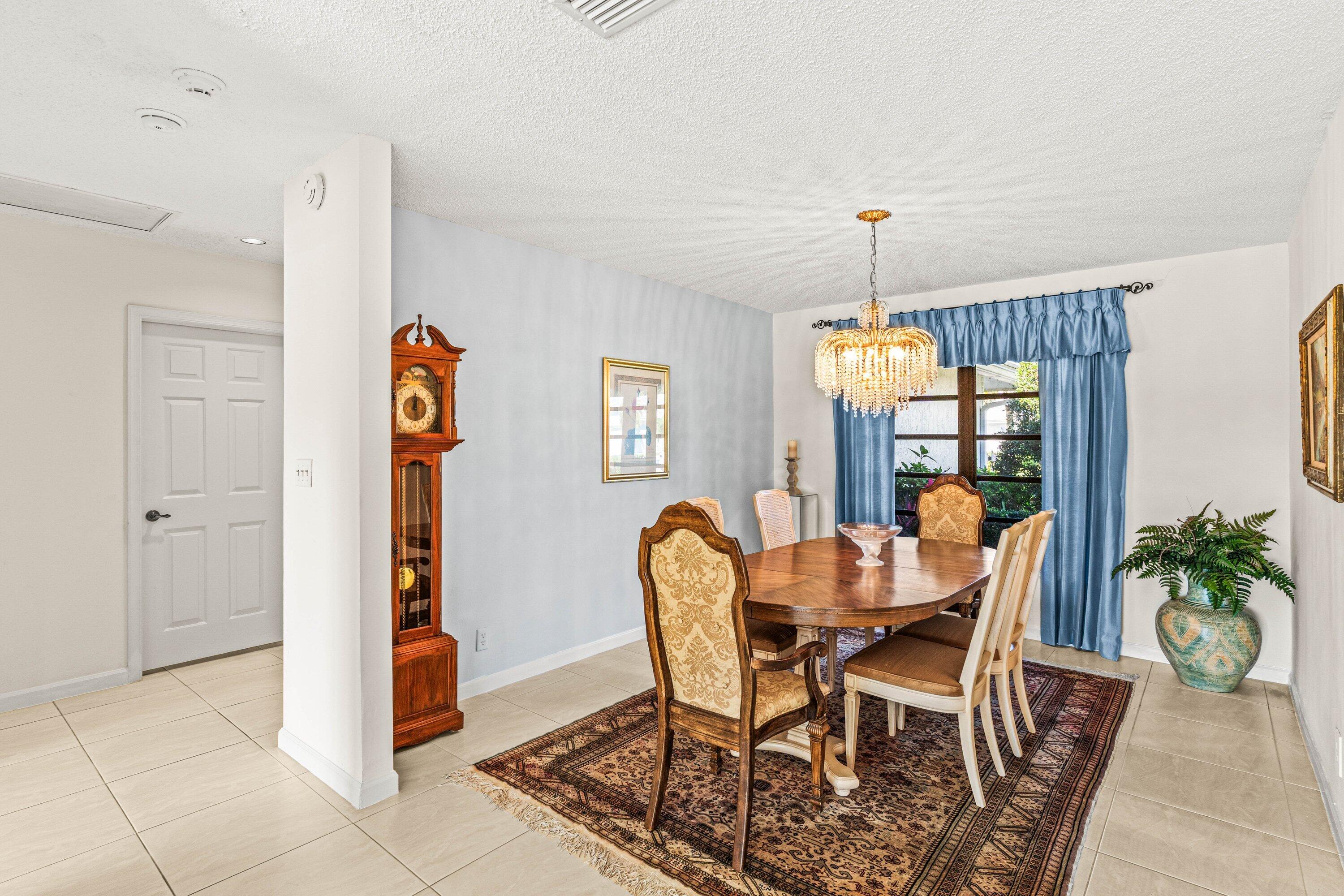 6426 Casabella Lane Boca Raton, FL 33433 - Photo 10 of 42 a dining room with furniture and window