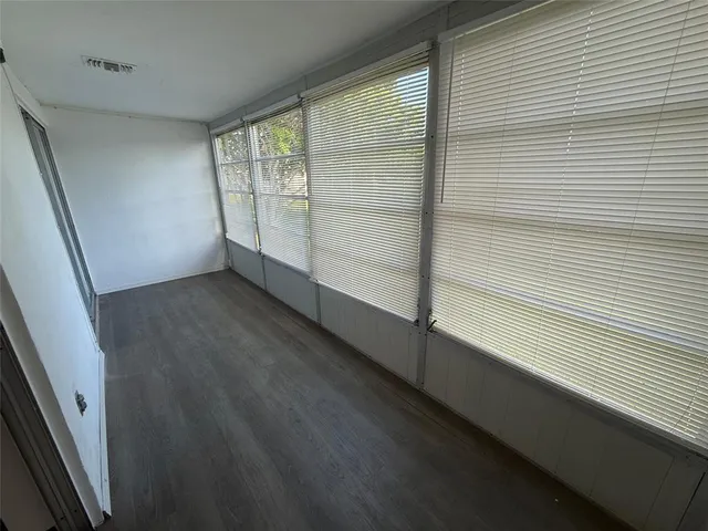 a car parked in front of a building