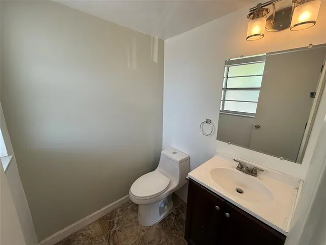 a bathroom with a sink and a toilet