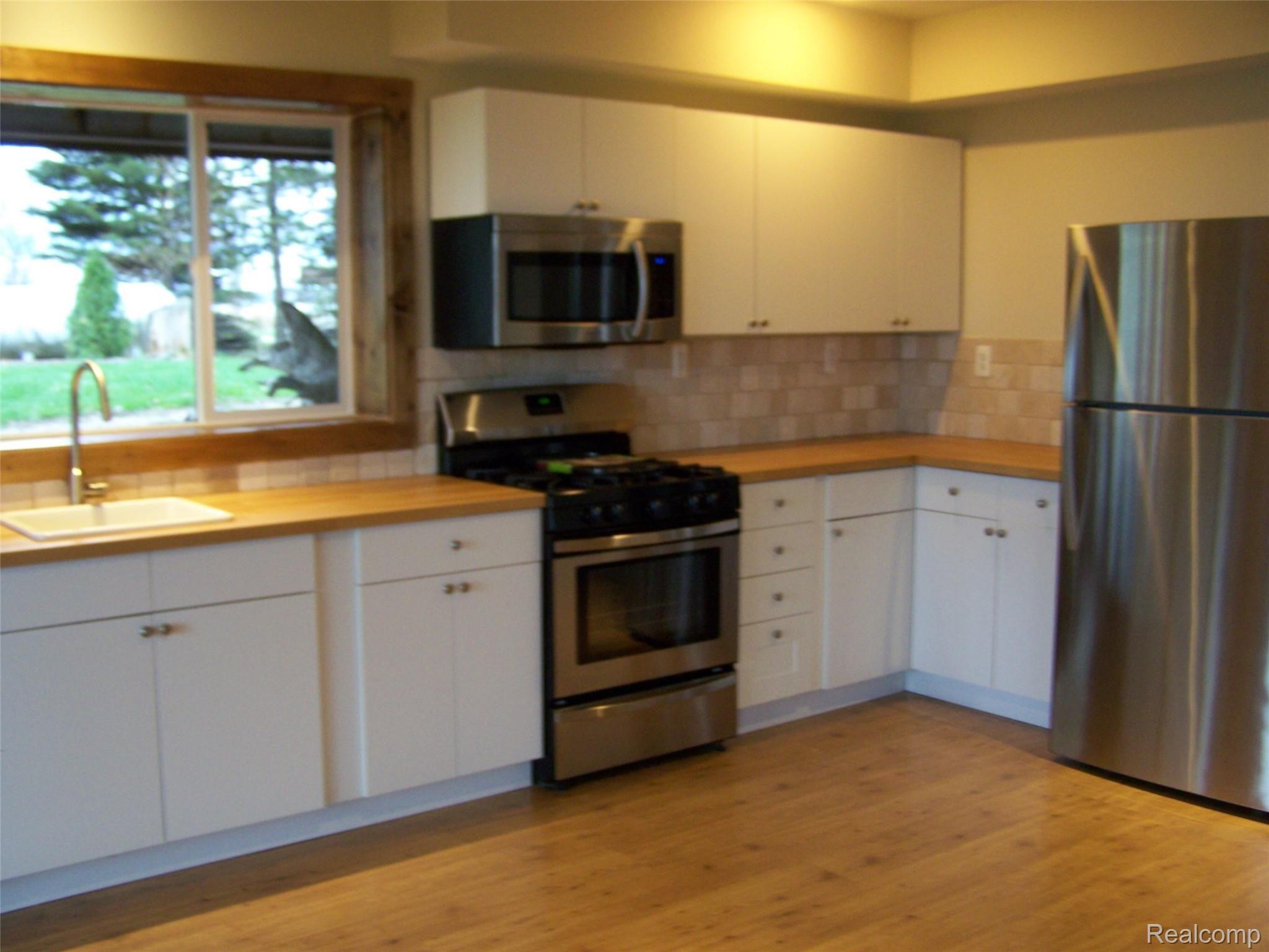 3325 Pointe Aux Barques Road Port Austin, MI 48467 - Photo 10 of 42 2nd Kitchen1.JPG