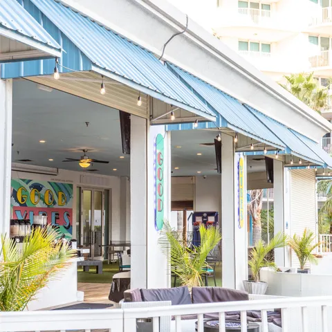 a view of a swimming pool with a yard