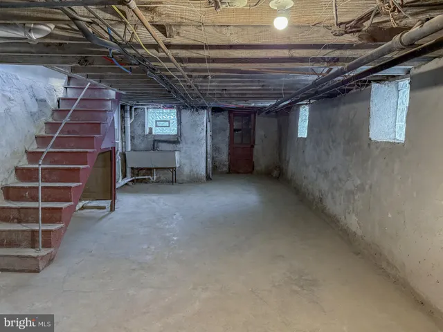 a front view of house with yard and outdoor seating