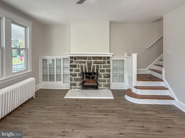 a view of entryway with wooden floor