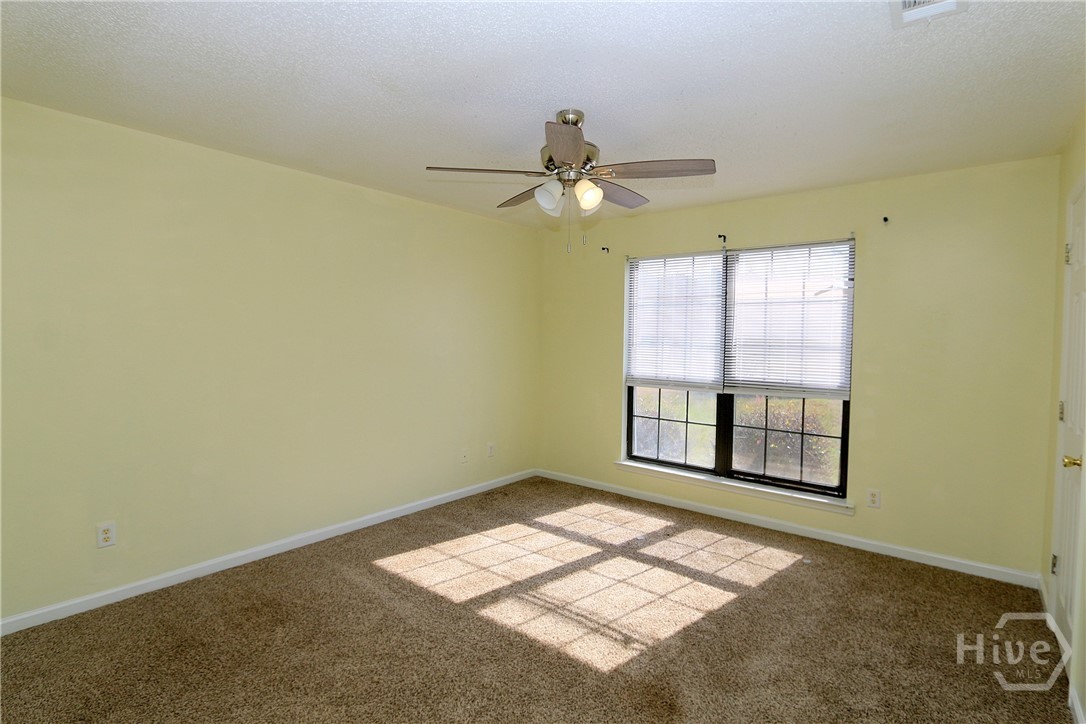 2352 Rowe Street Hinesville, GA 31313 - Photo 13 of 25 Spacious primary ensuite with TWO walk in closets