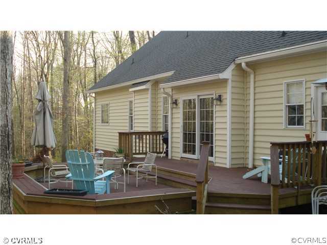 1611 Genito Road Crozier, VA 23039 - Photo 14 of 15 a picture of a living room with furniture