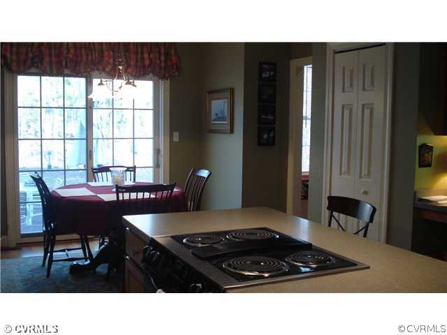 1611 Genito Road Crozier, VA 23039 - Photo 6 of 15 a kitchen view and dining room with a table and chair