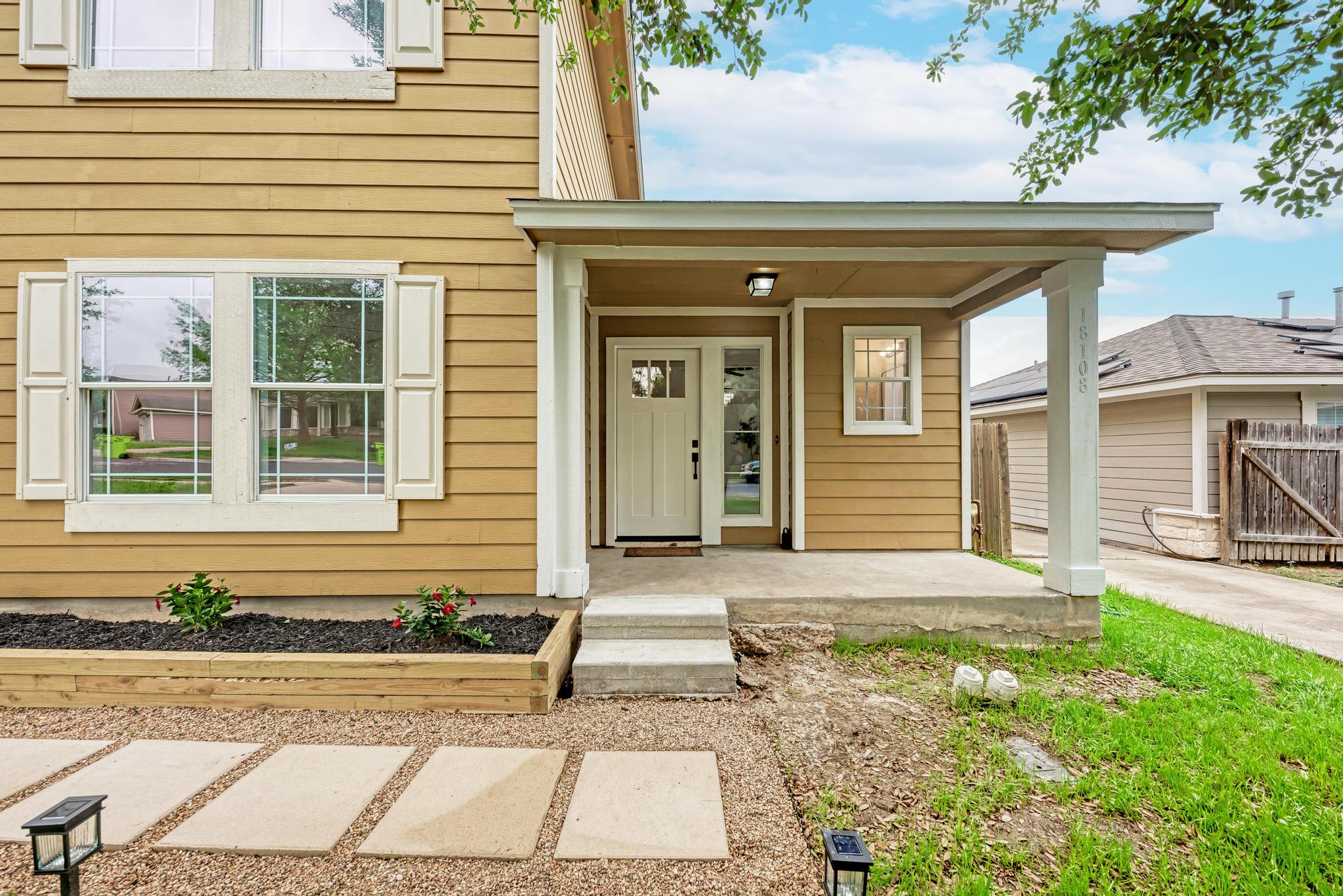 18108 Belfry Pass Manor, TX 78653 - Photo 11 of 40 front view of a house