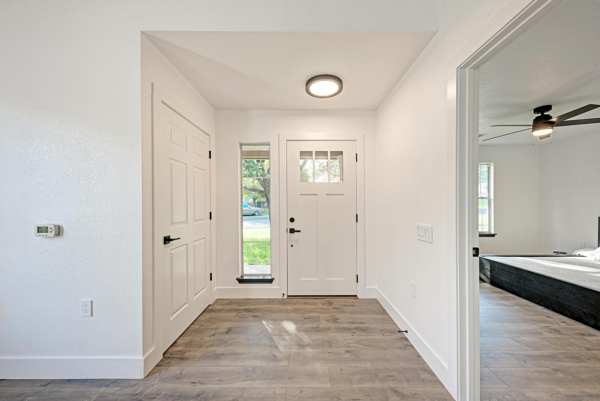 18108 Belfry Pass Manor, TX 78653 - Photo 12 of 40 a view of a bedroom from the hallway