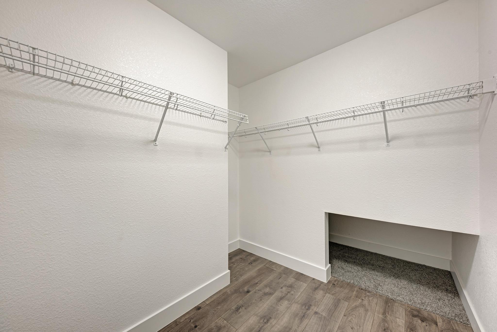 18108 Belfry Pass Manor, TX 78653 - Photo 26 of 40 a view of an empty walk in closet