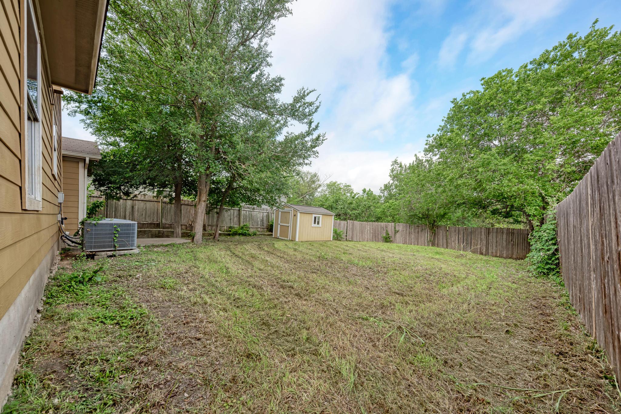 18108 Belfry Pass Manor, TX 78653 - Photo 35 of 40 a house view with backyard space