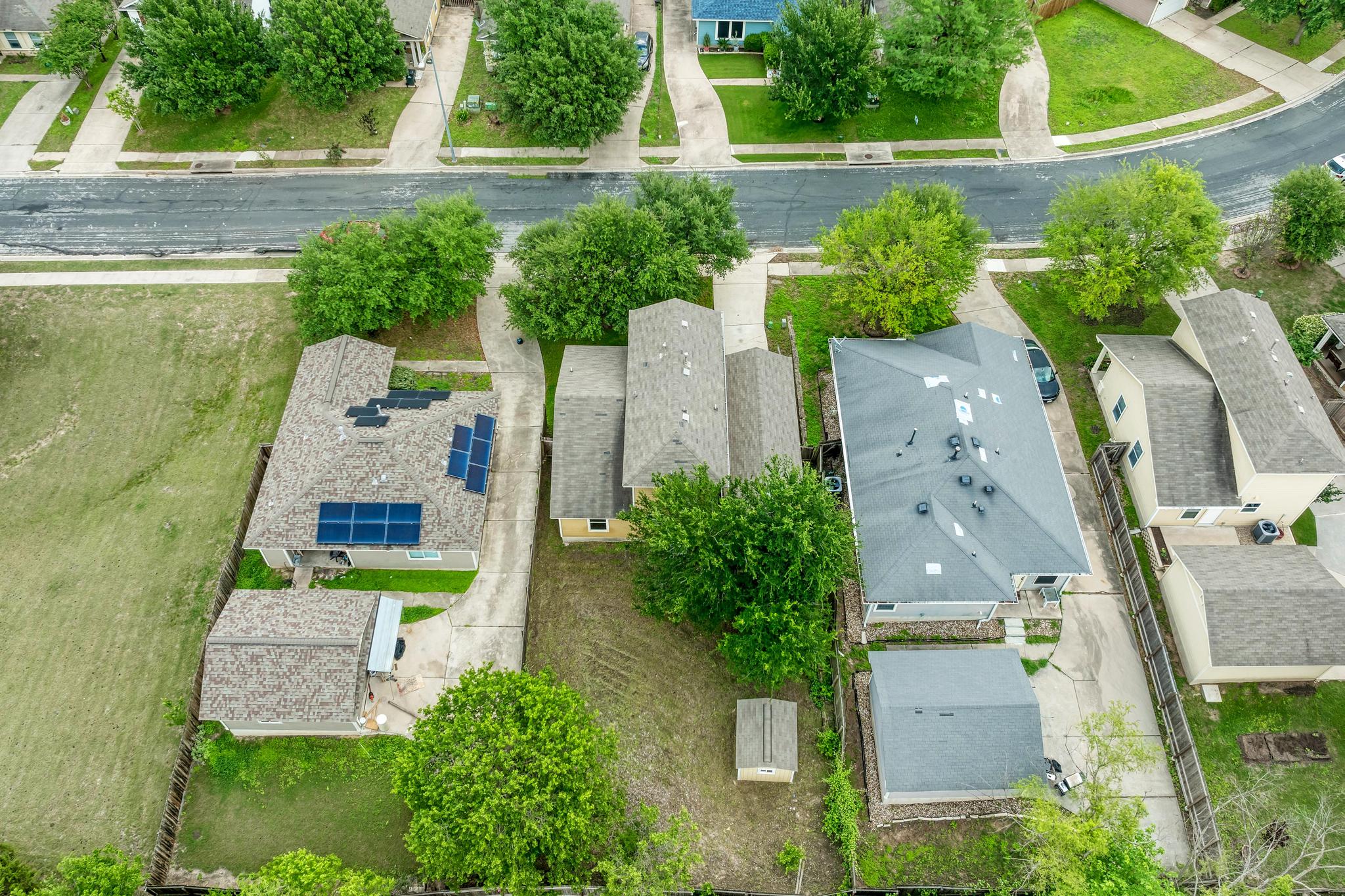 18108 Belfry Pass Manor, TX 78653 - Photo 39 of 40 an aerial view of a house with outdoor space and street view