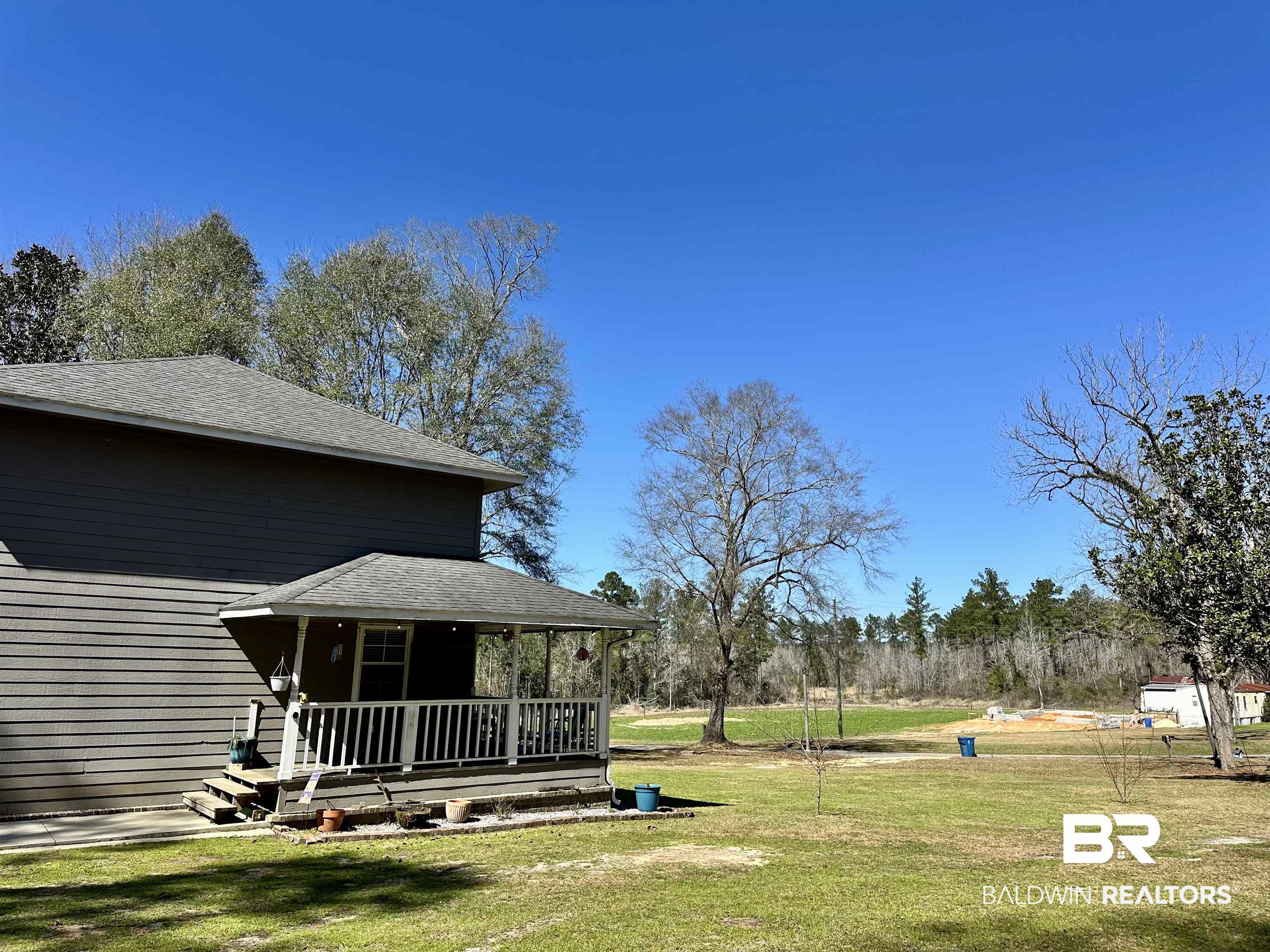 120 McGougin Road Brewton, AL 36426 - Photo 19 of 21 View of yard with covered porch