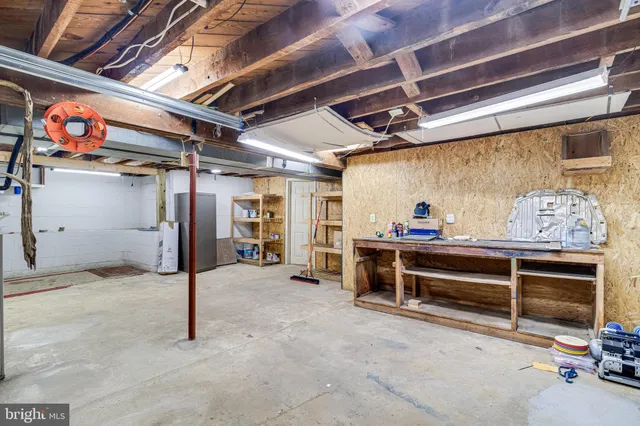 a view of an empty room with storage