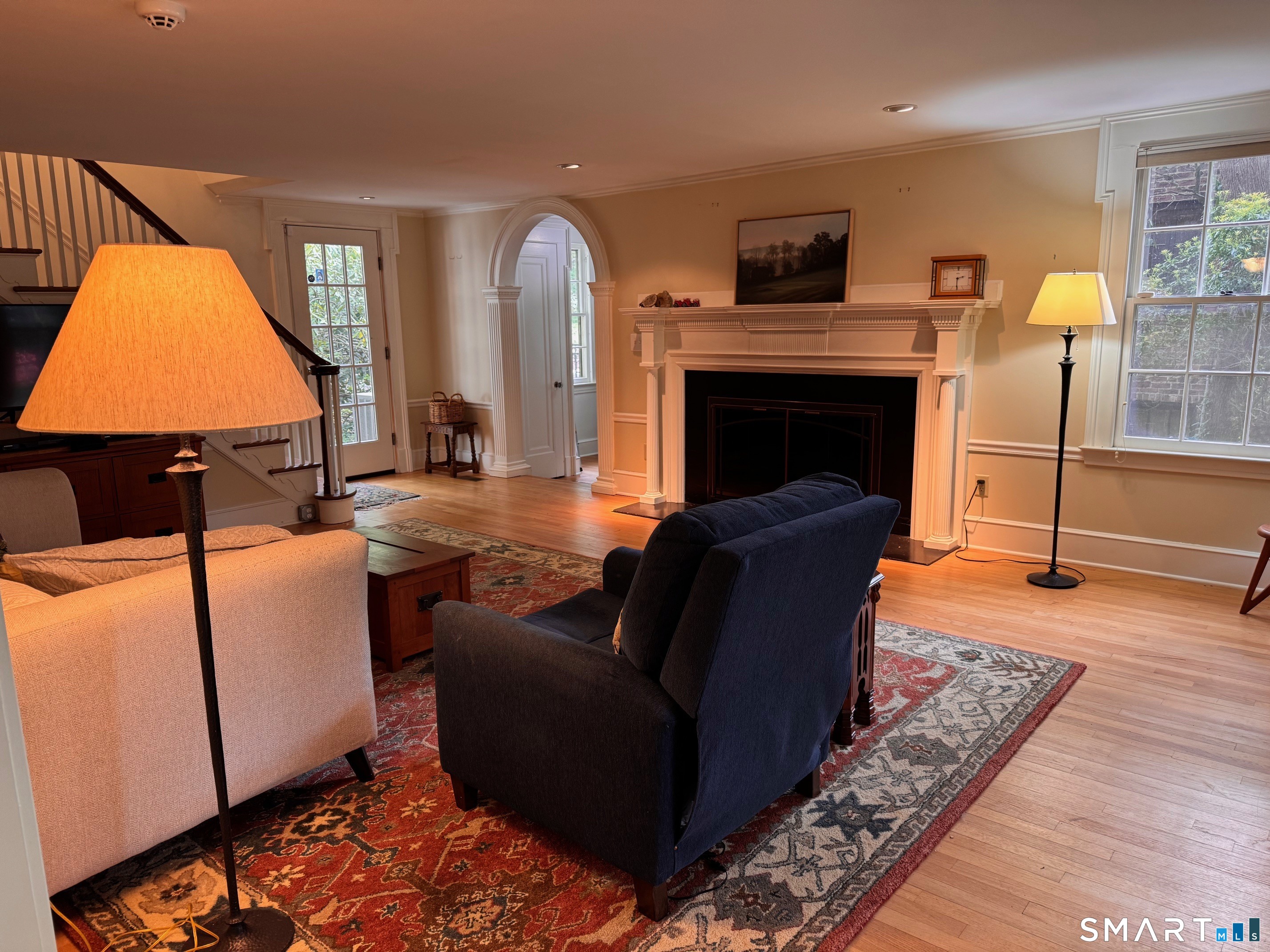 57 Mill Rock Road Hamden, CT 06517 - Photo 3 of 24 a living room with furniture and a fireplace