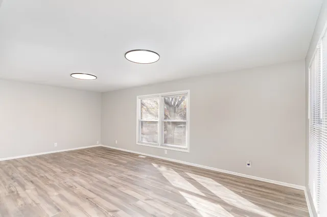 an empty room with windows