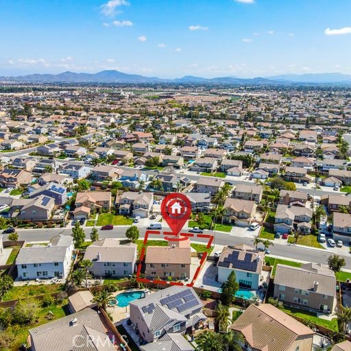 6469 Cattleman Drive Eastvale, CA 92880 - Photo 5 of 35 an aerial view of a city