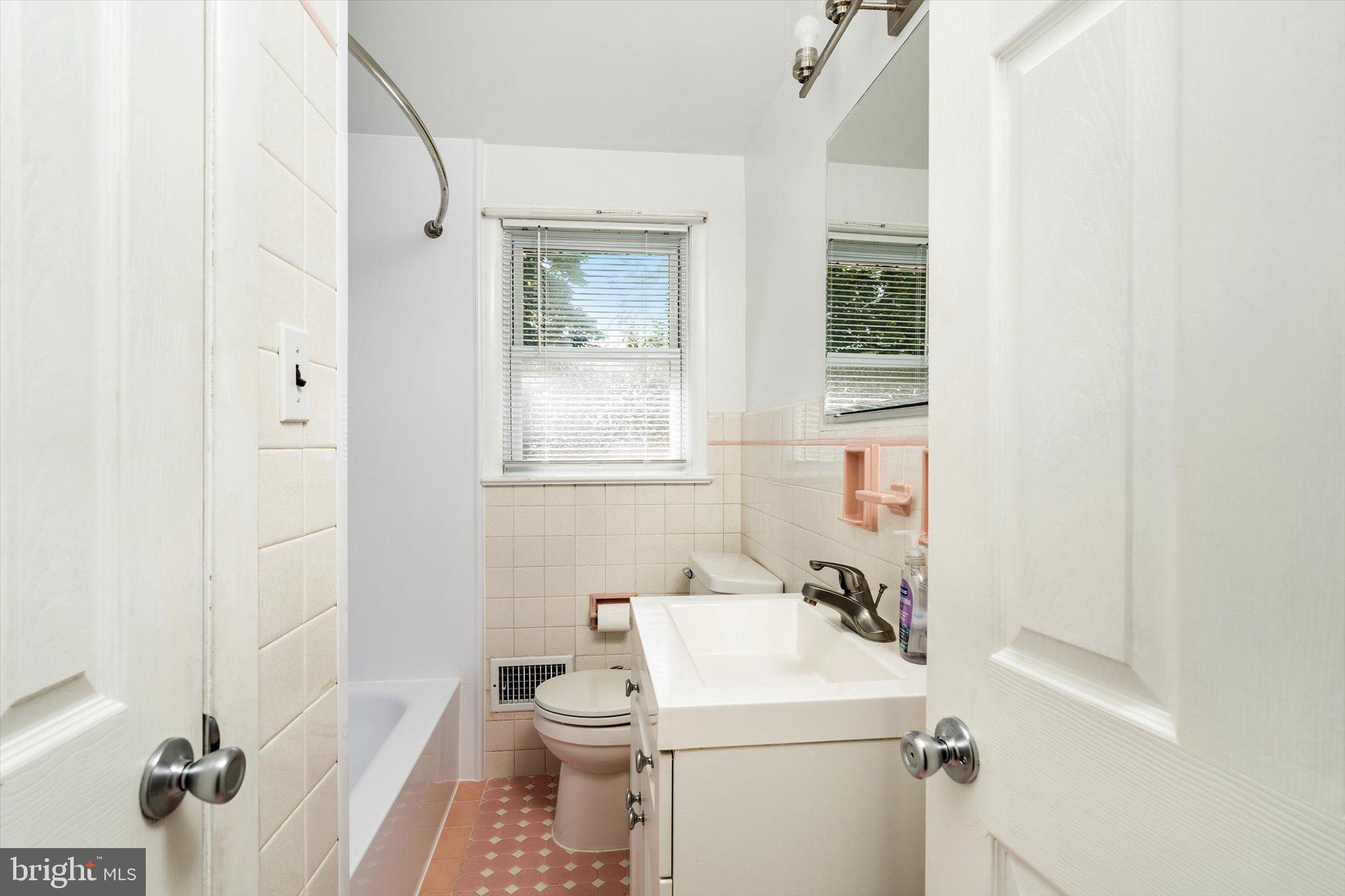 81 3rd Avenue Hamilton, NJ 08619 - Photo 14 of 26 a bathroom with a sink toilet and shower