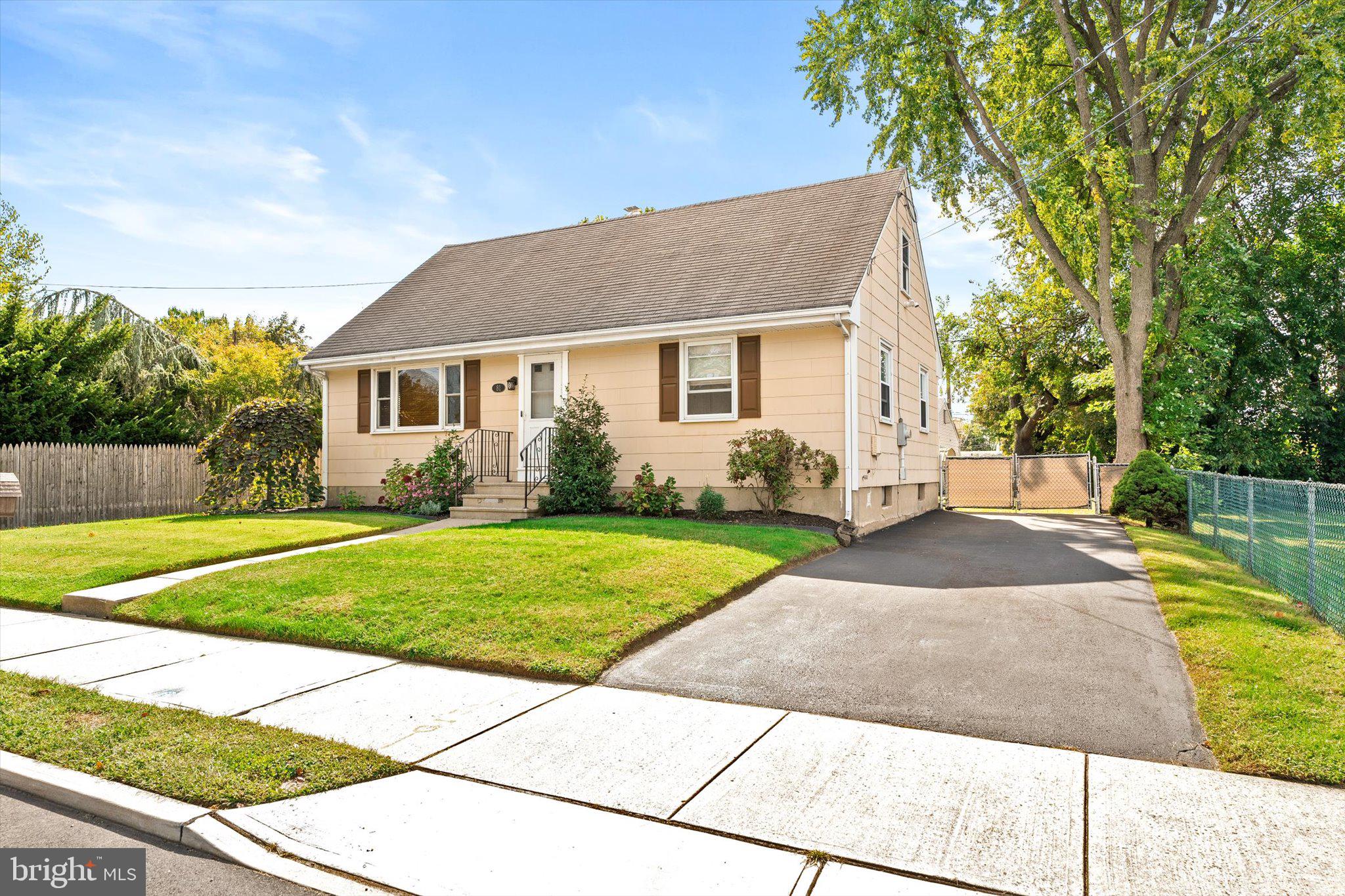 81 3rd Avenue Hamilton, NJ 08619 - Photo 2 of 26 a view of a house with a yard and plants