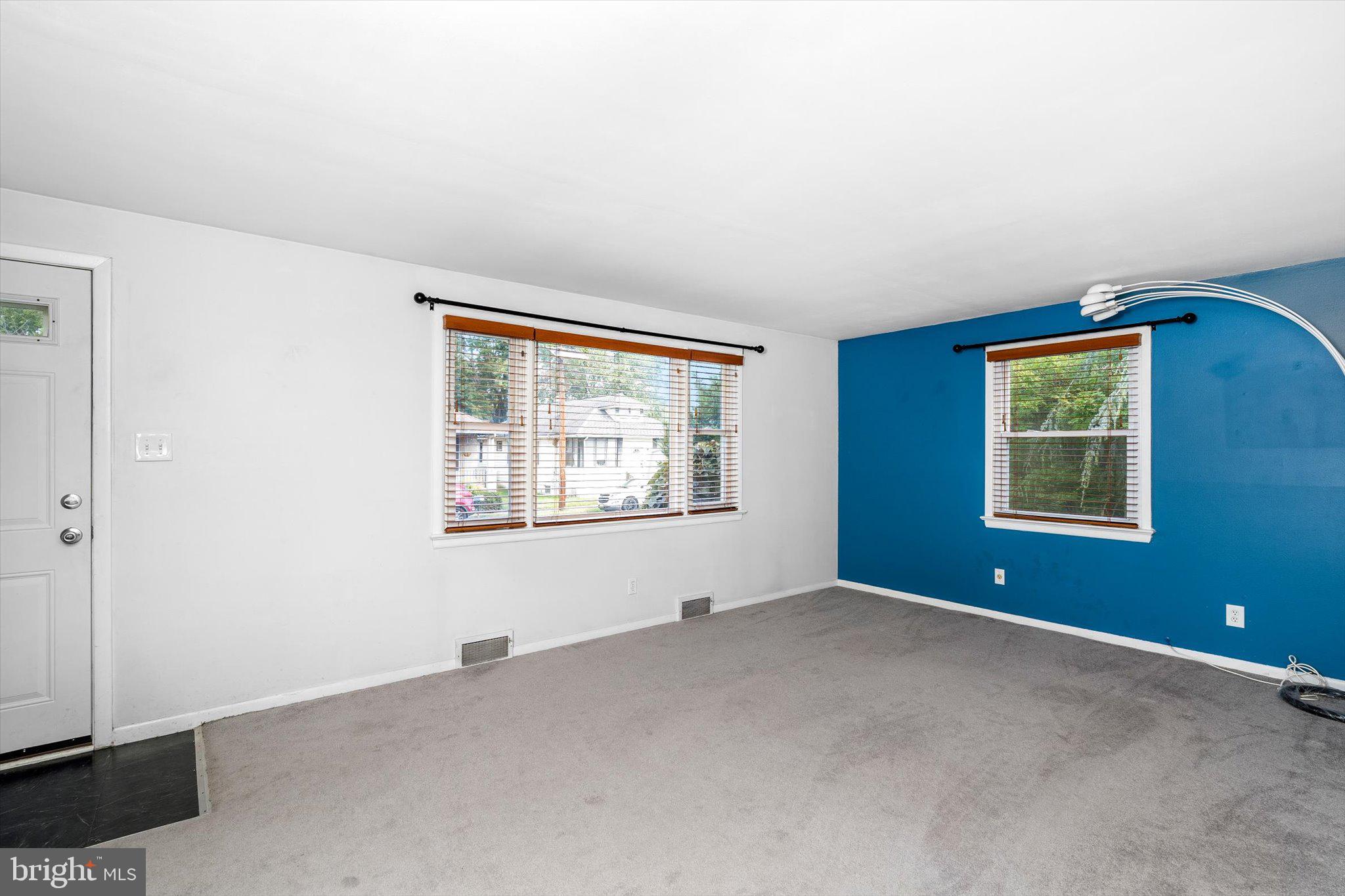 81 3rd Avenue Hamilton, NJ 08619 - Photo 4 of 26 an empty room with windows