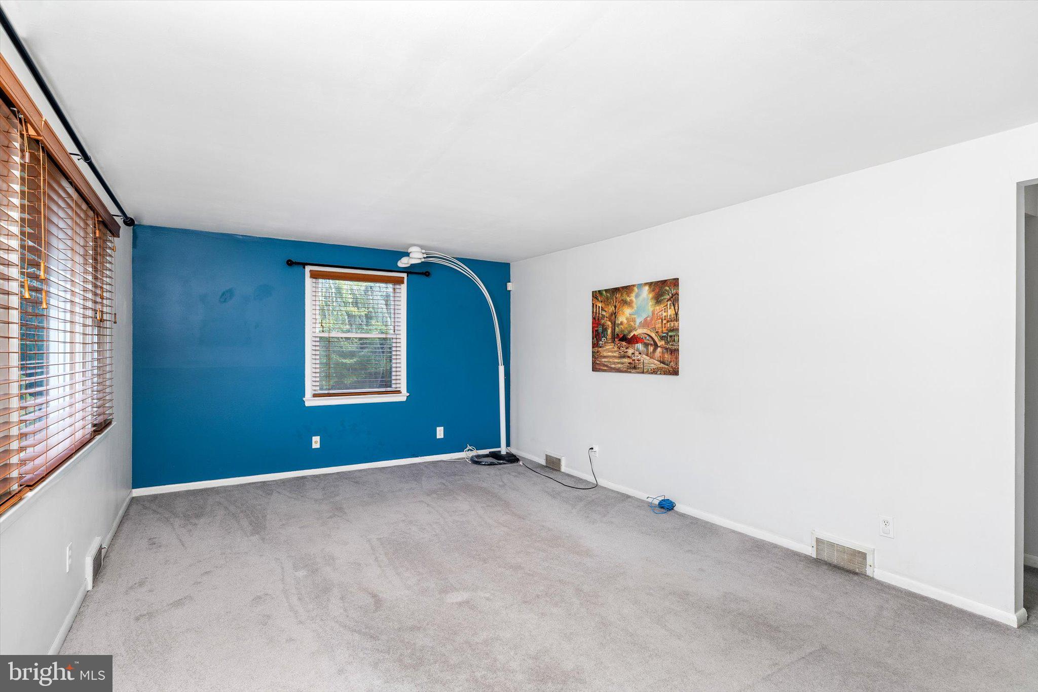 81 3rd Avenue Hamilton, NJ 08619 - Photo 5 of 26 an empty room with windows