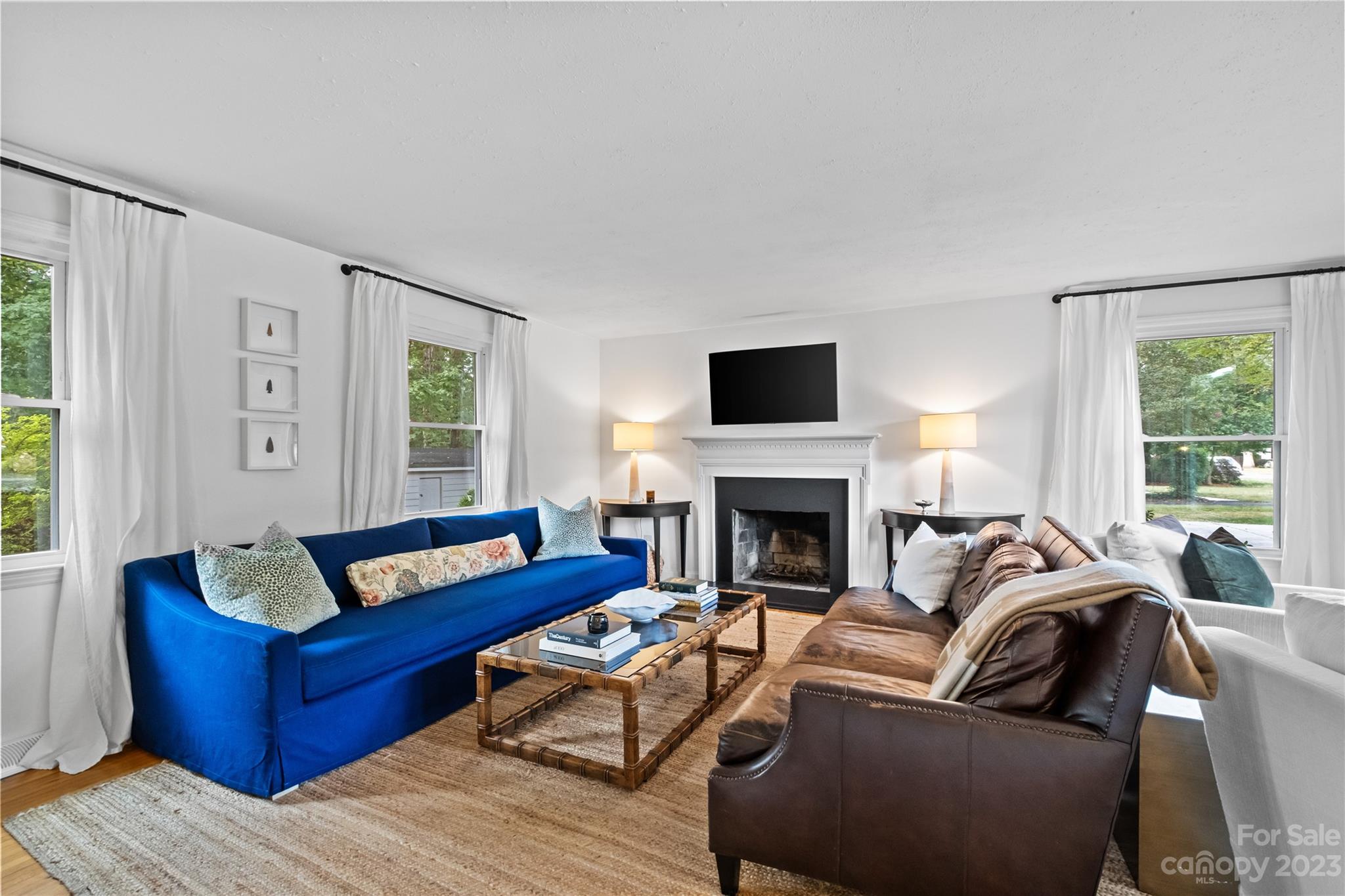 4014 Sulkirk Road Charlotte, NC 28210 - Photo 2 of 23 a living room with furniture fireplace and a window