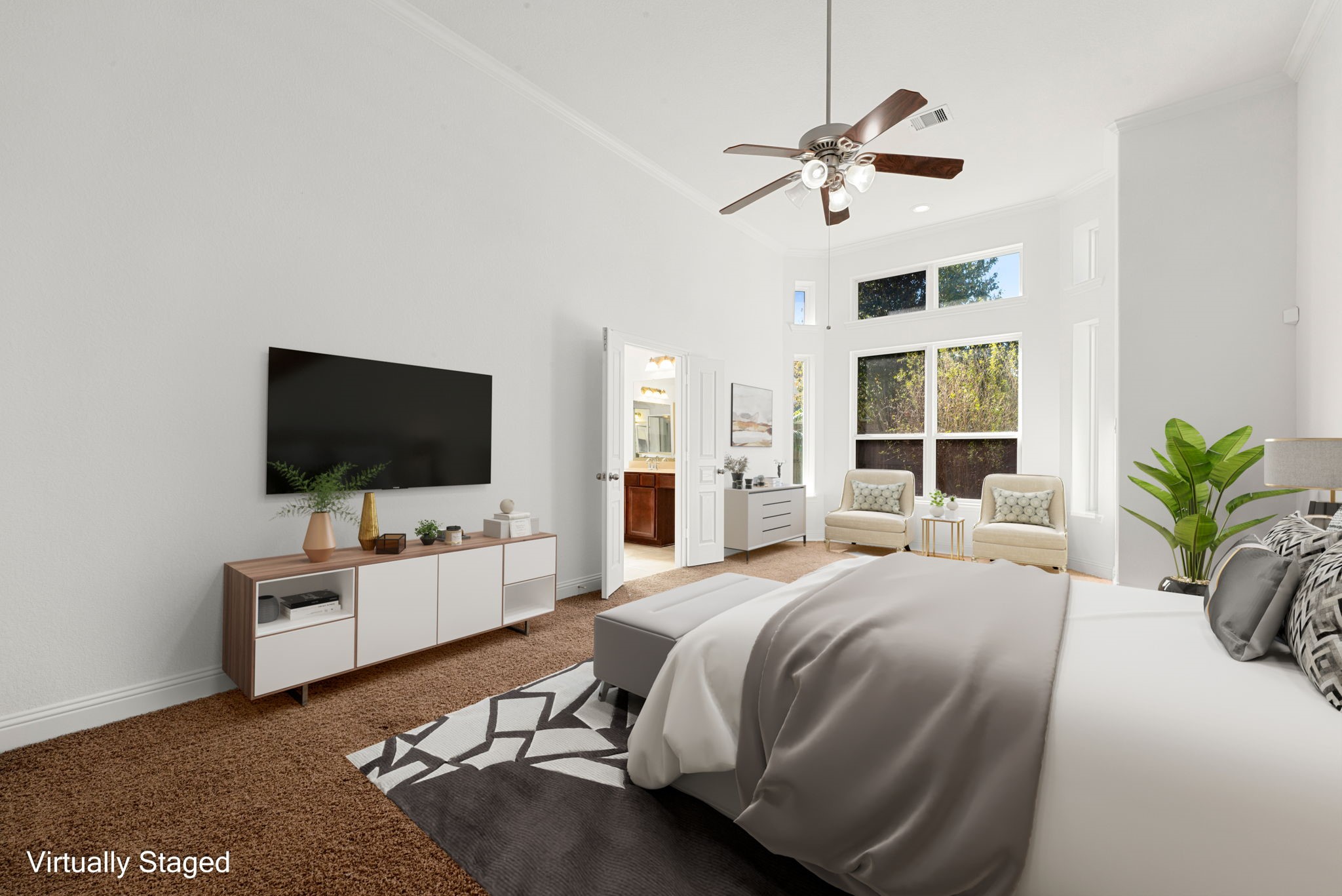 22719 Shieldhall Lane Tomball, TX 77375 - Photo 19 of 49 a bedroom with a bed and a flat screen tv