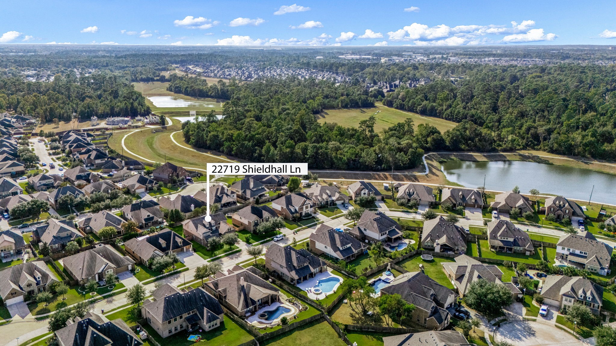 22719 Shieldhall Lane Tomball, TX 77375 - Photo 2 of 49 a view of a city