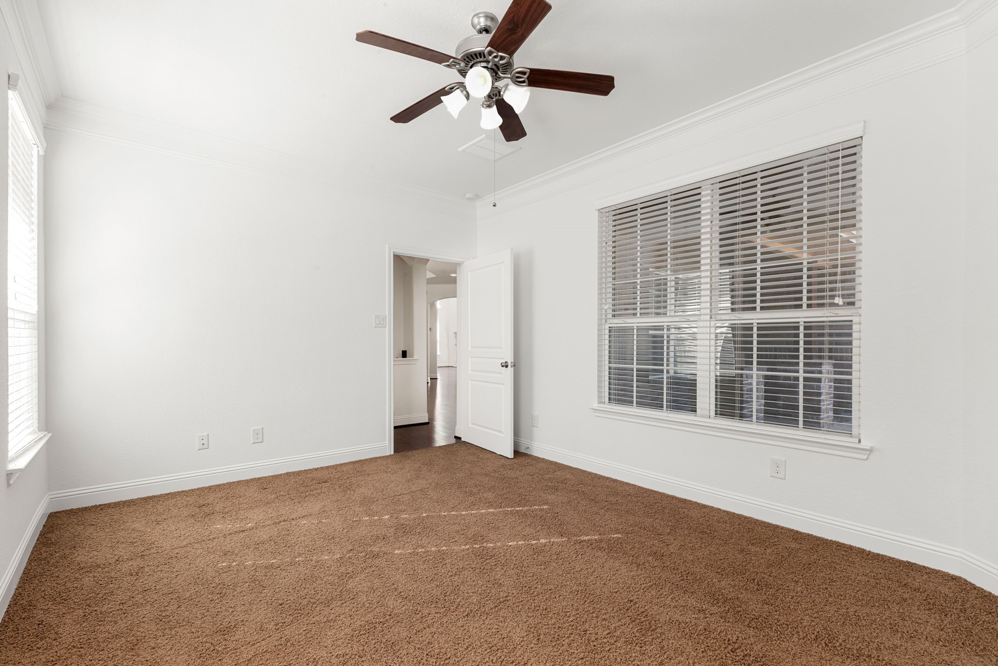 22719 Shieldhall Lane Tomball, TX 77375 - Photo 25 of 49 a view of an empty room with a window