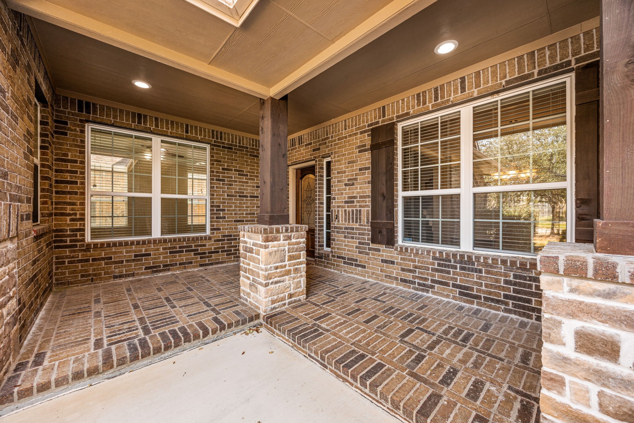 22719 Shieldhall Lane Tomball, TX 77375 - Photo 4 of 49 front view of a house with a large window