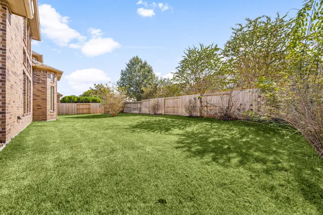 a view of a backyard with a garden