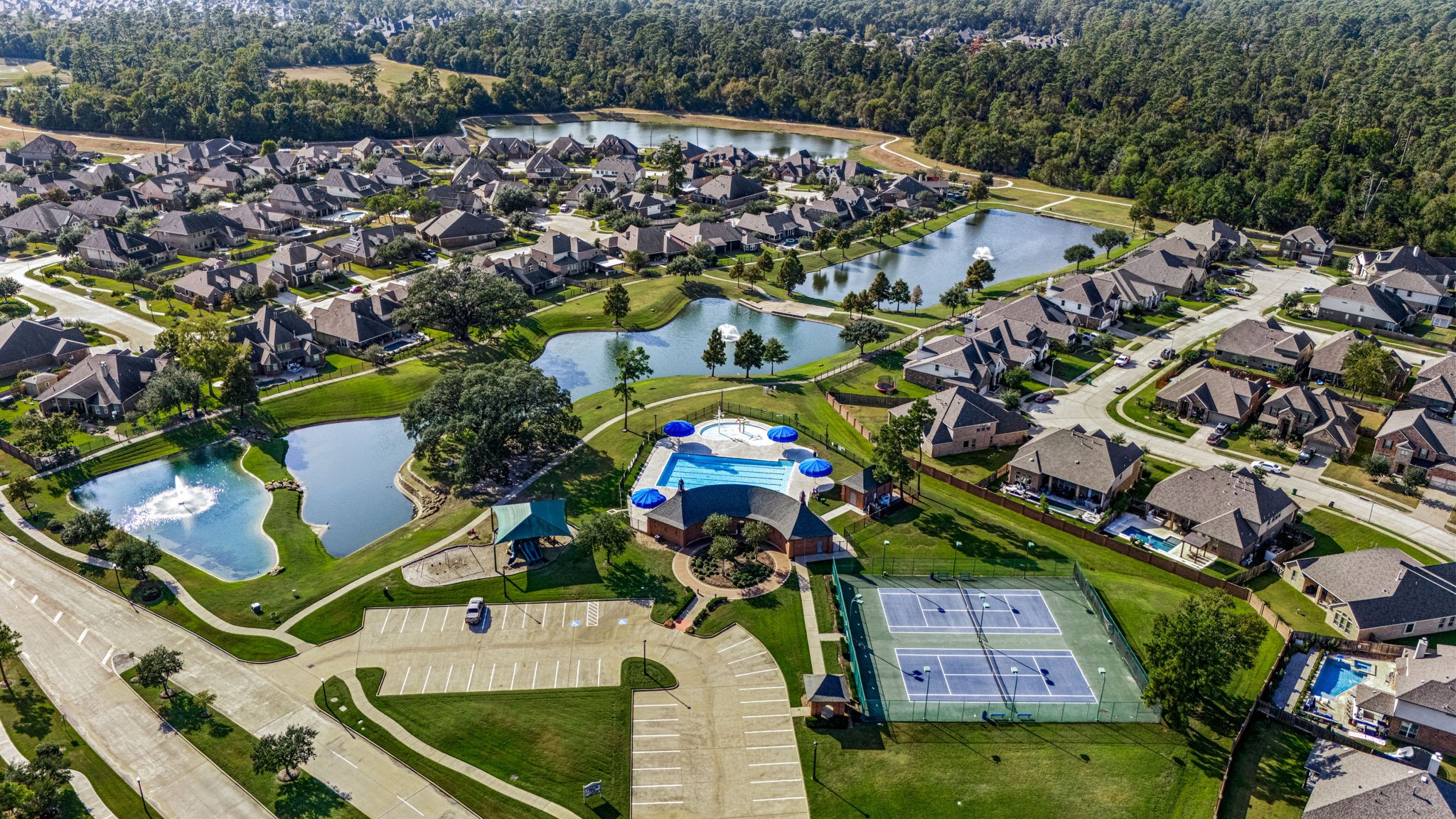 22719 Shieldhall Lane Tomball, TX 77375 - Photo 47 of 49 an aerial view of a house with a swimming pool outdoor seating