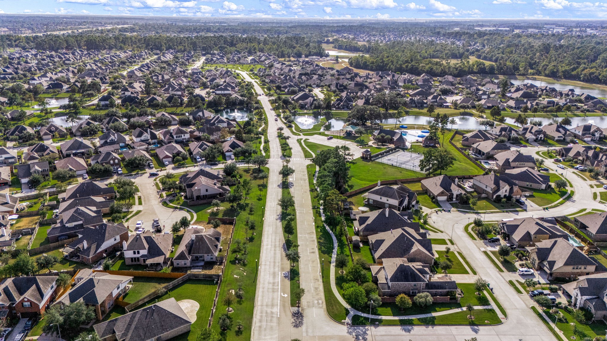 22719 Shieldhall Lane Tomball, TX 77375 - Photo 48 of 49 an aerial view of residential houses with outdoor space