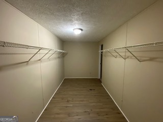 1368 Dee Kennedy Road Auburn, GA 30011 - Photo 8 of 15 a view of a walk in closet