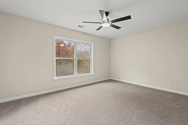 an aerial view of houses with yard