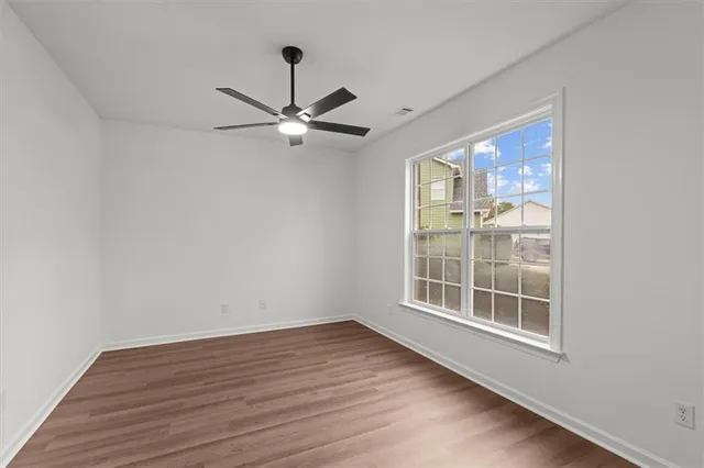 a workspace with furniture and a book shelf