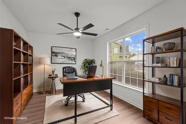 a view of staircase with wooden floor and stairs