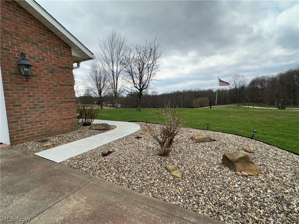 17437 Early Cemetary Road Newcomerstown, OH 43832 - Photo 12 of 49 with landscaping, and new sidewalks