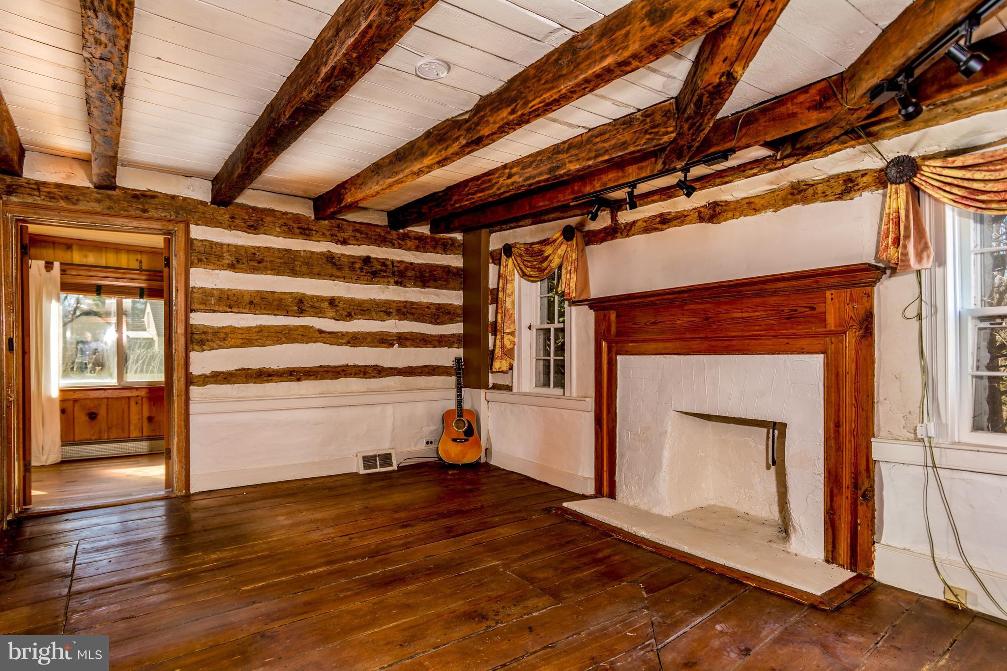 2806 Crenshaw Road Marshall, VA 20115 - Photo 11 of 30 a view of an empty room with wooden floor and a window