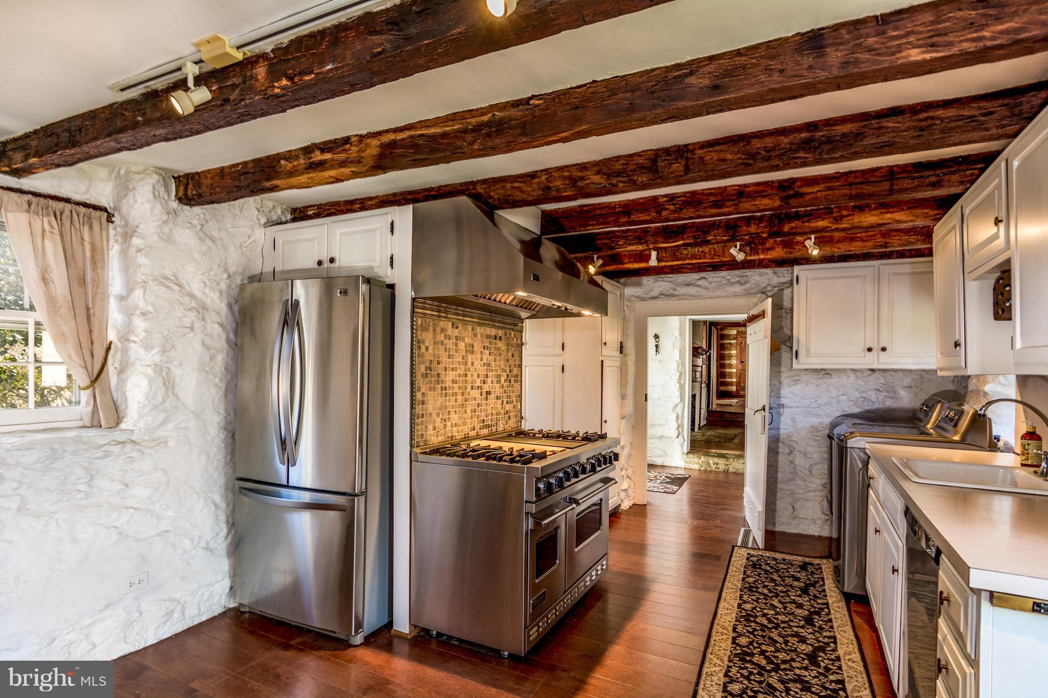 2806 Crenshaw Road Marshall, VA 20115 - Photo 3 of 30 a kitchen with stainless steel appliances a refrigerator and a stove