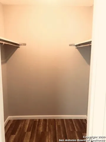 a view of small space with racks on the wall