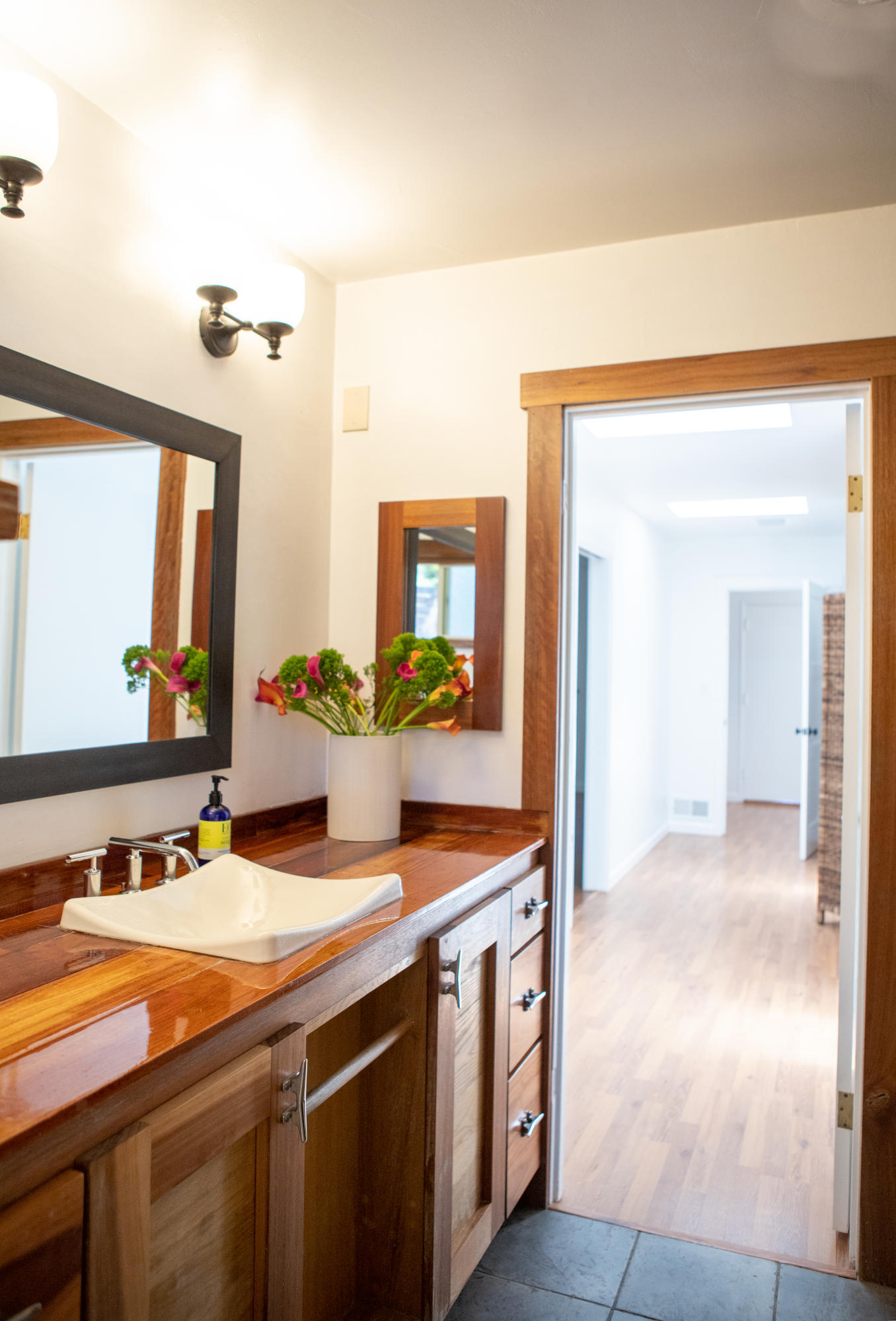 2948 Torito Road Montecito, CA 93108 - Photo 19 of 25 a bathroom with a sink and a mirror