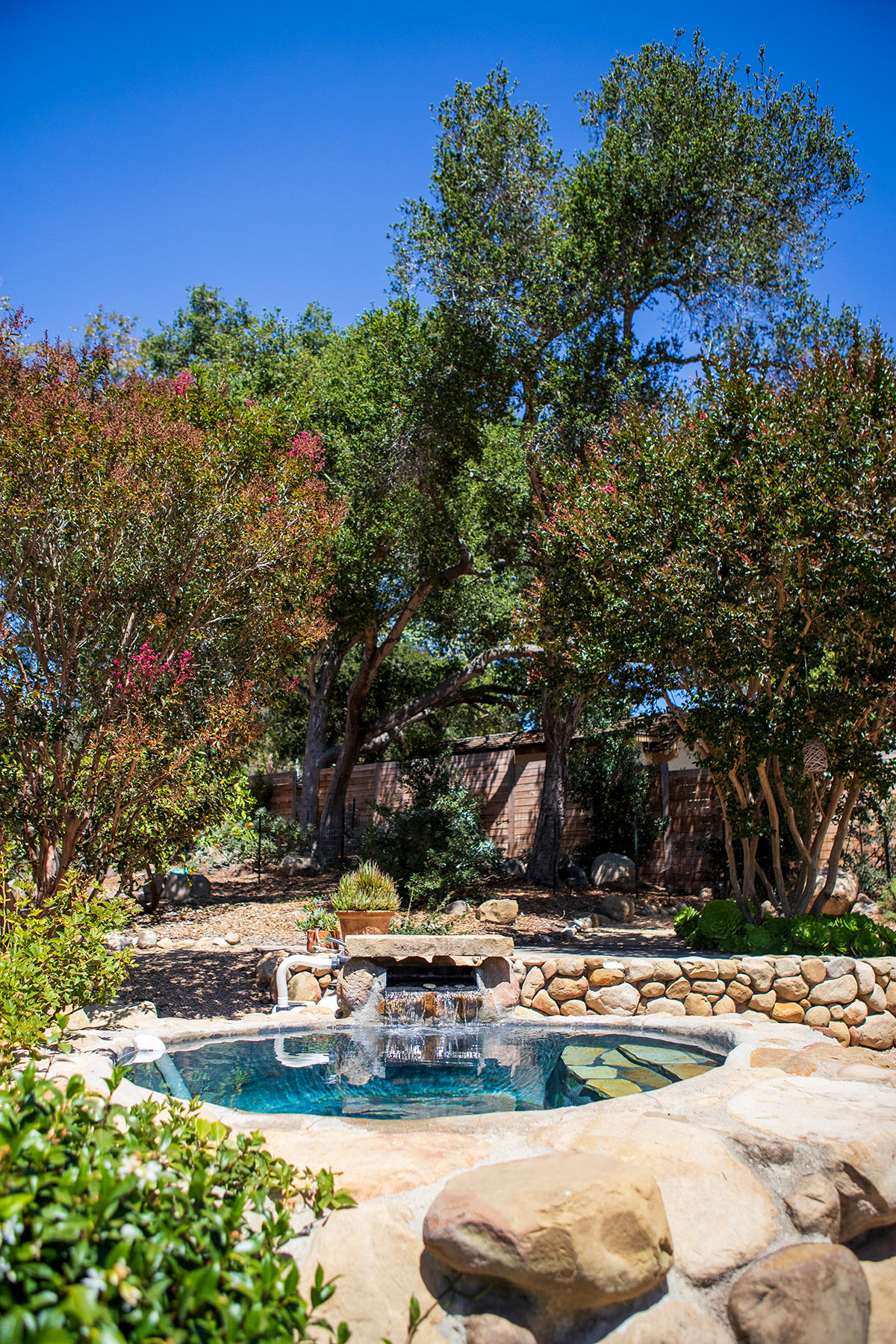 2948 Torito Road Montecito, CA 93108 - Photo 5 of 25 a view of swimming pool with lawn chairs and plants