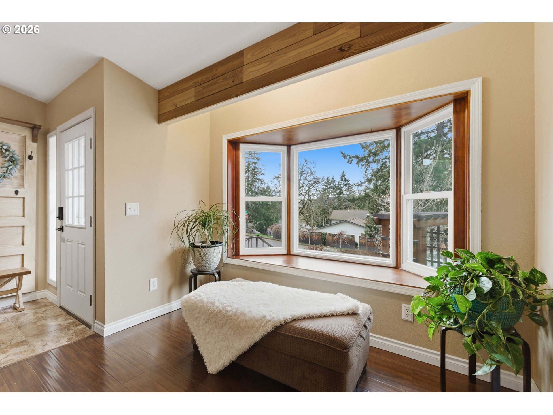 1315 High Street Gladstone, OR 97027 - Photo 11 of 36 a bedroom with a large bed and a large window