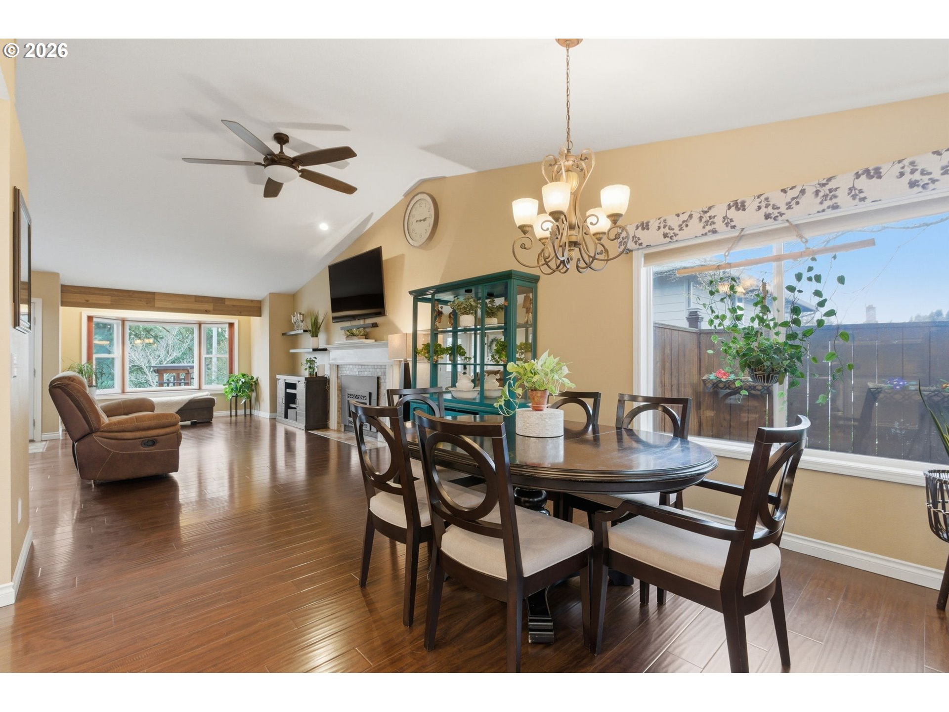 1315 High Street Gladstone, OR 97027 - Photo 13 of 36 a dining room with furniture a chandelier and wooden floor