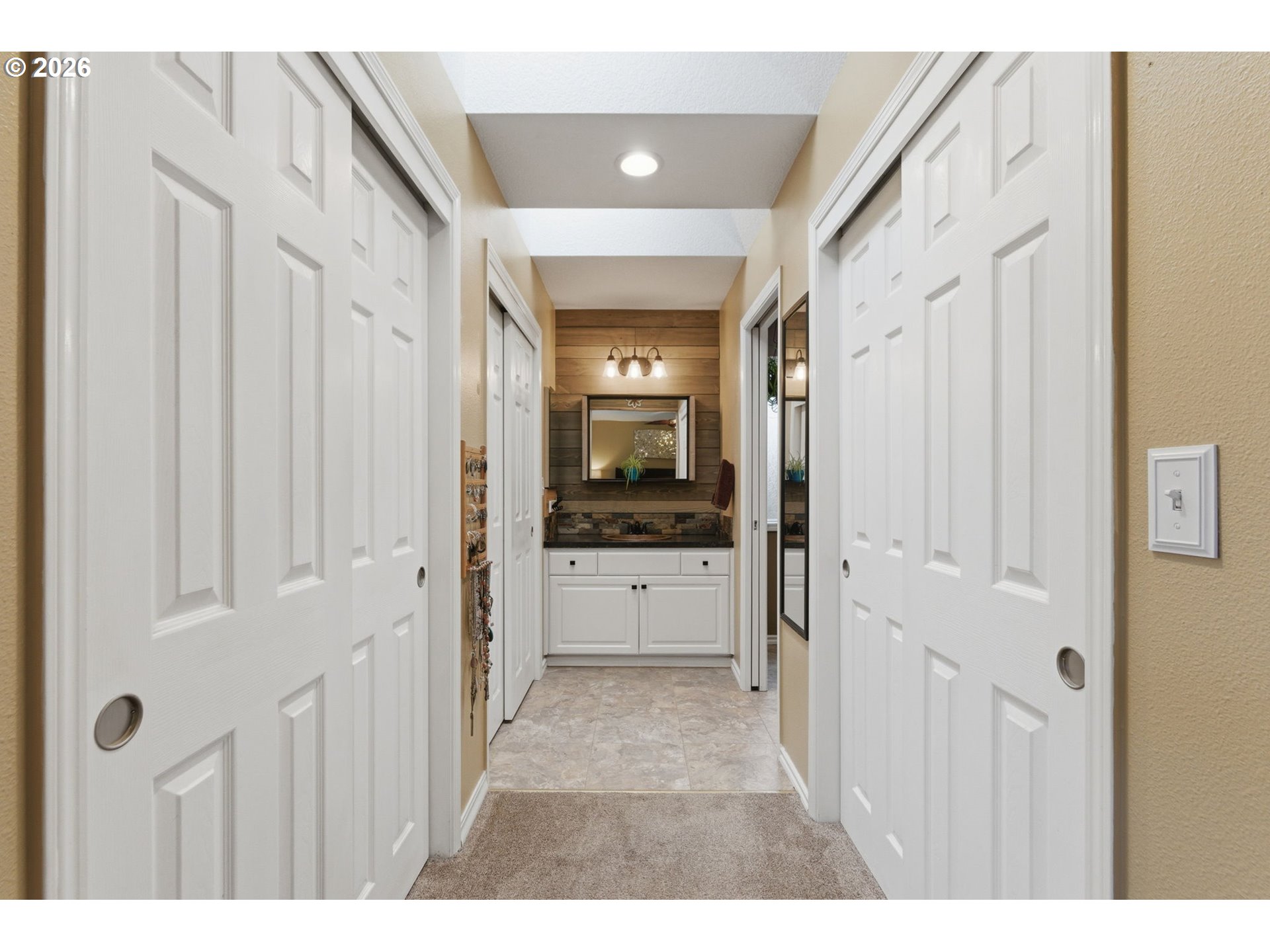 1315 High Street Gladstone, OR 97027 - Photo 20 of 36 a view of a hallway with a white walls