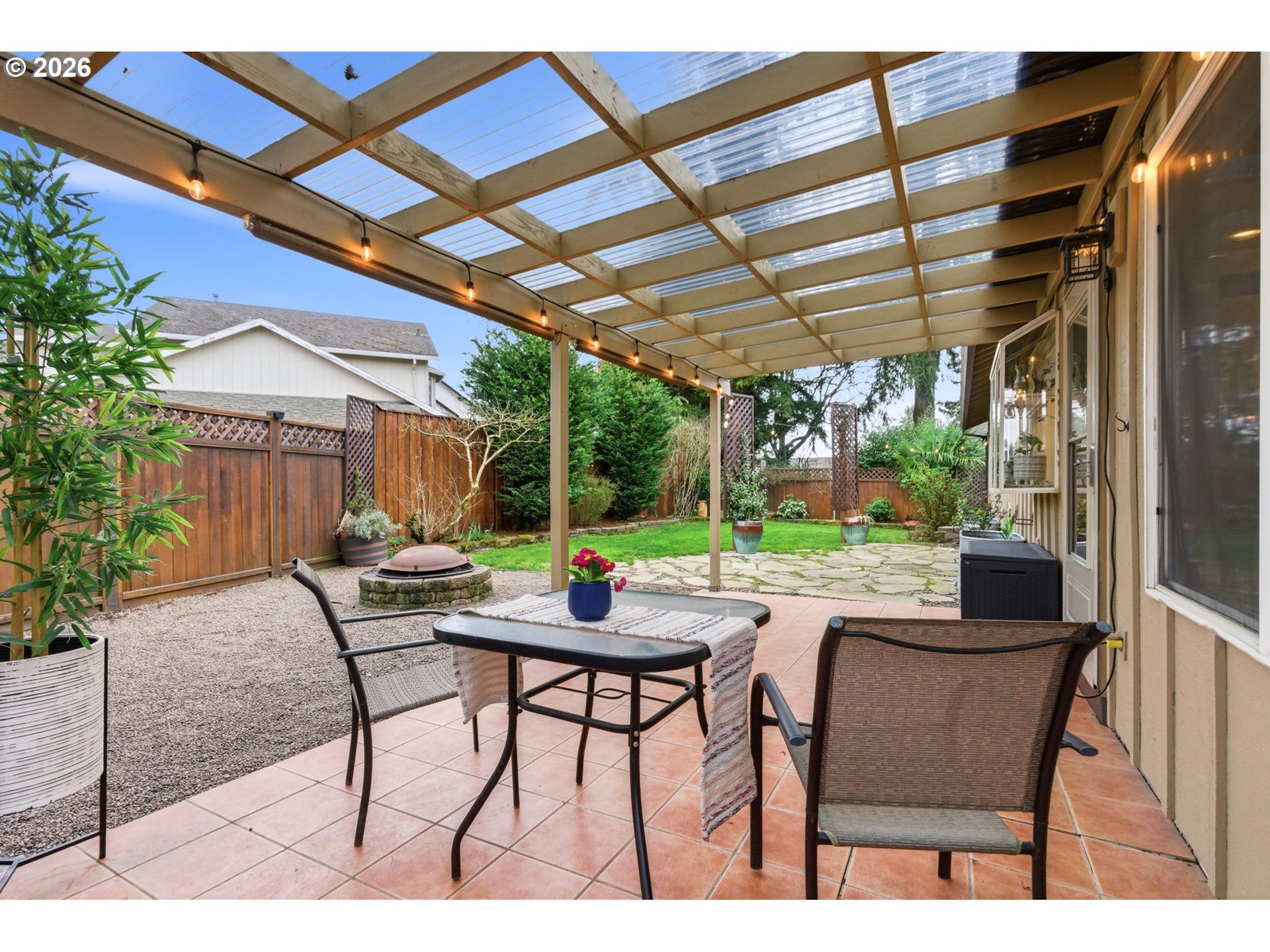 1315 High Street Gladstone, OR 97027 - Photo 29 of 36 a view of a patio with a table chairs and a backyard